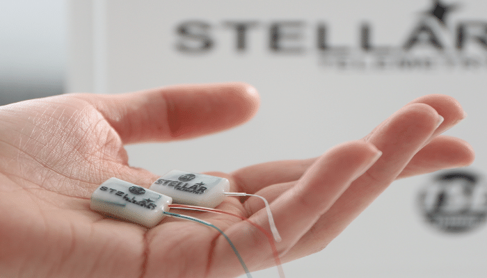 two stellar transmitters compared to a hand